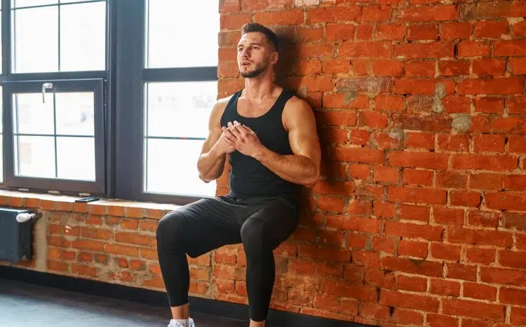 Man Doing Wall Squat